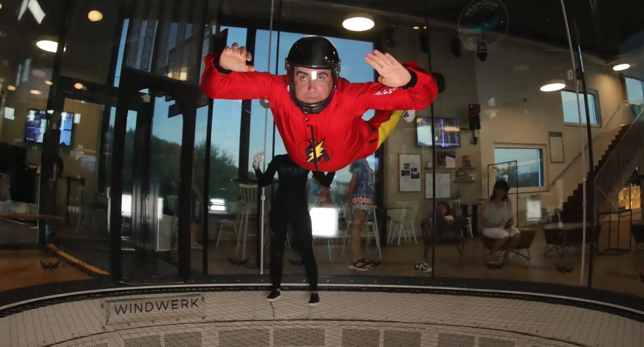 Indoor skydiving, also known as vertical wind tunnel skydiving or bodyflight